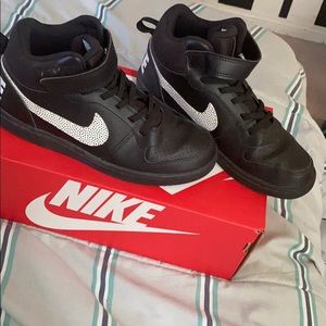 Kids black and white Nike High Tops